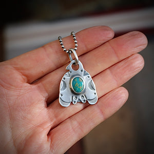 Sterling Silver Thunderbird with Bandits Mine turquoise pendant Necklace